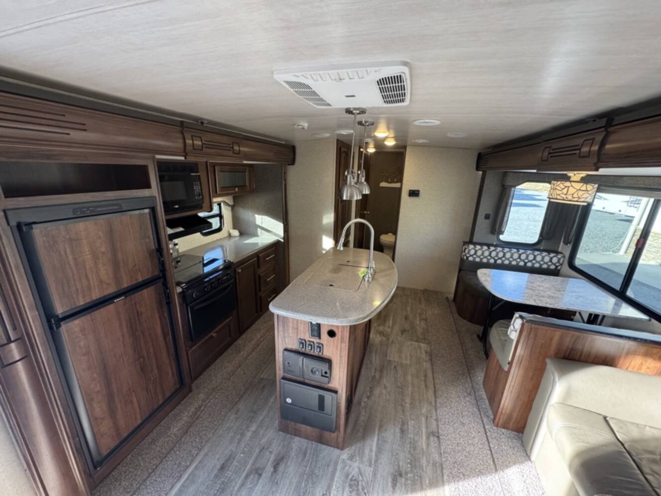 A photo of this 2017 Heartland NORTH TRAIL CALIBER 27RBDS