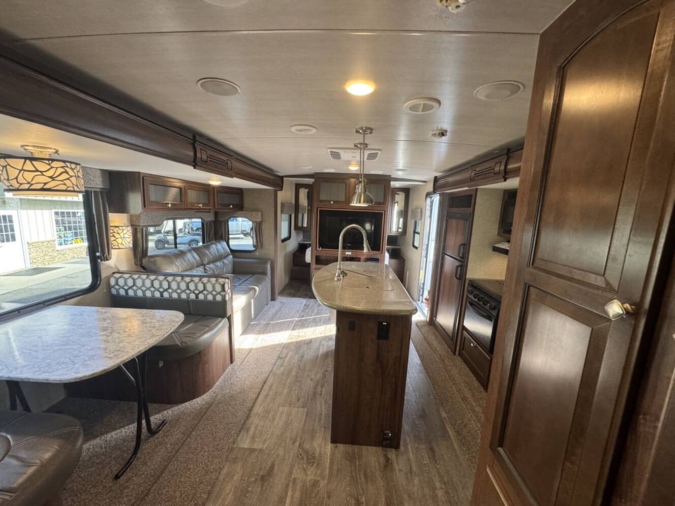 A photo of this 2017 Heartland NORTH TRAIL CALIBER 27RBDS