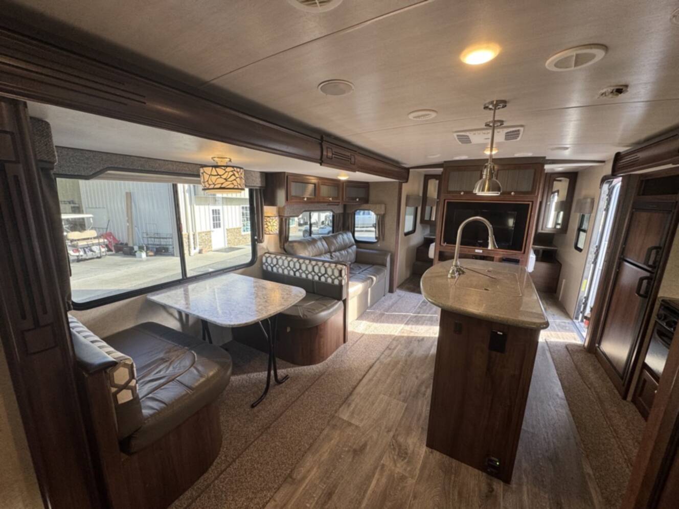 A photo of this 2017 Heartland NORTH TRAIL CALIBER 27RBDS
