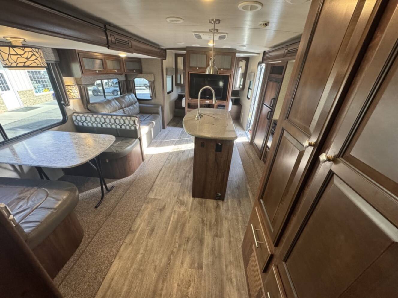 A photo of this 2017 Heartland NORTH TRAIL CALIBER 27RBDS