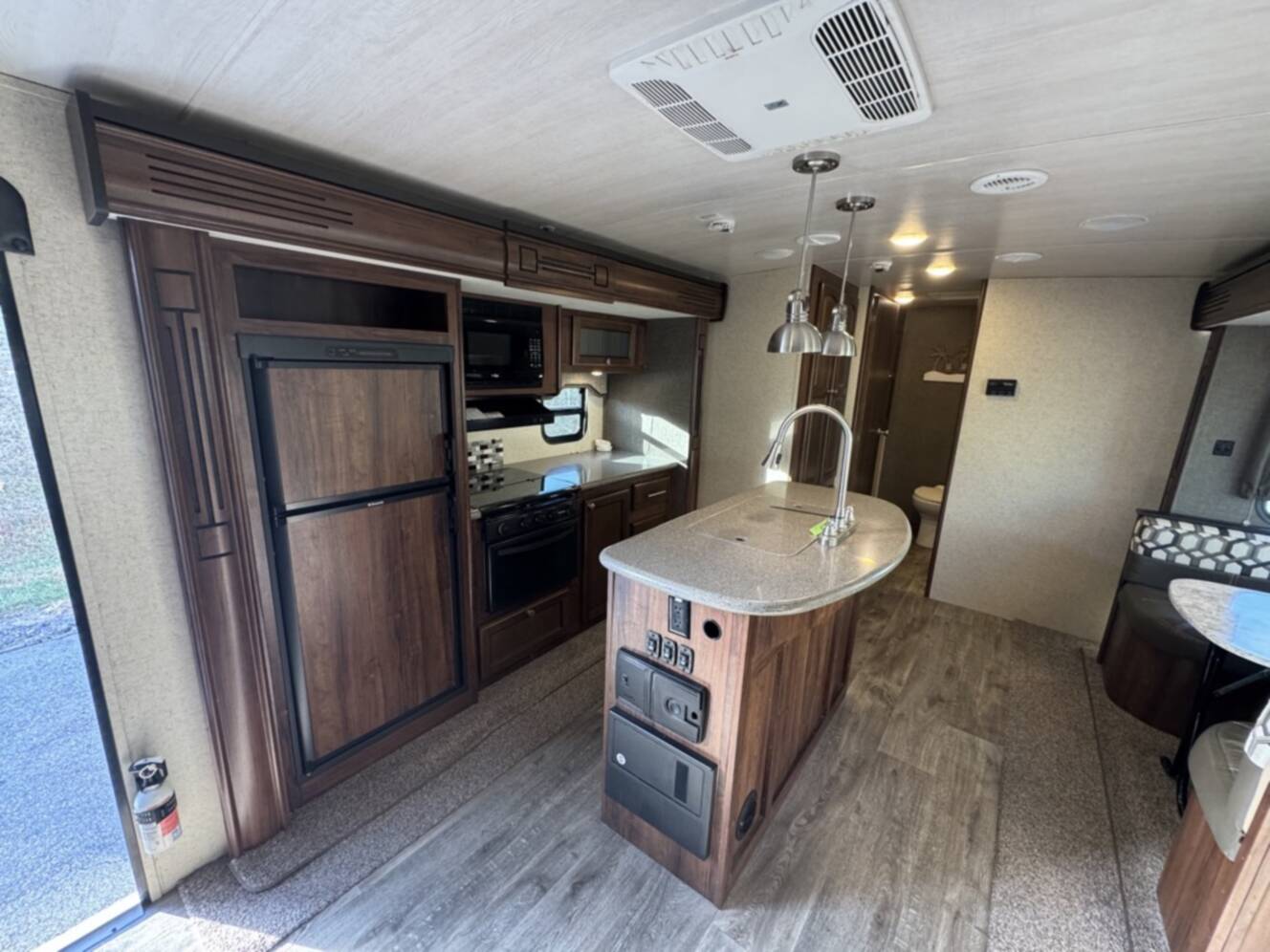 A photo of this 2017 Heartland NORTH TRAIL CALIBER 27RBDS