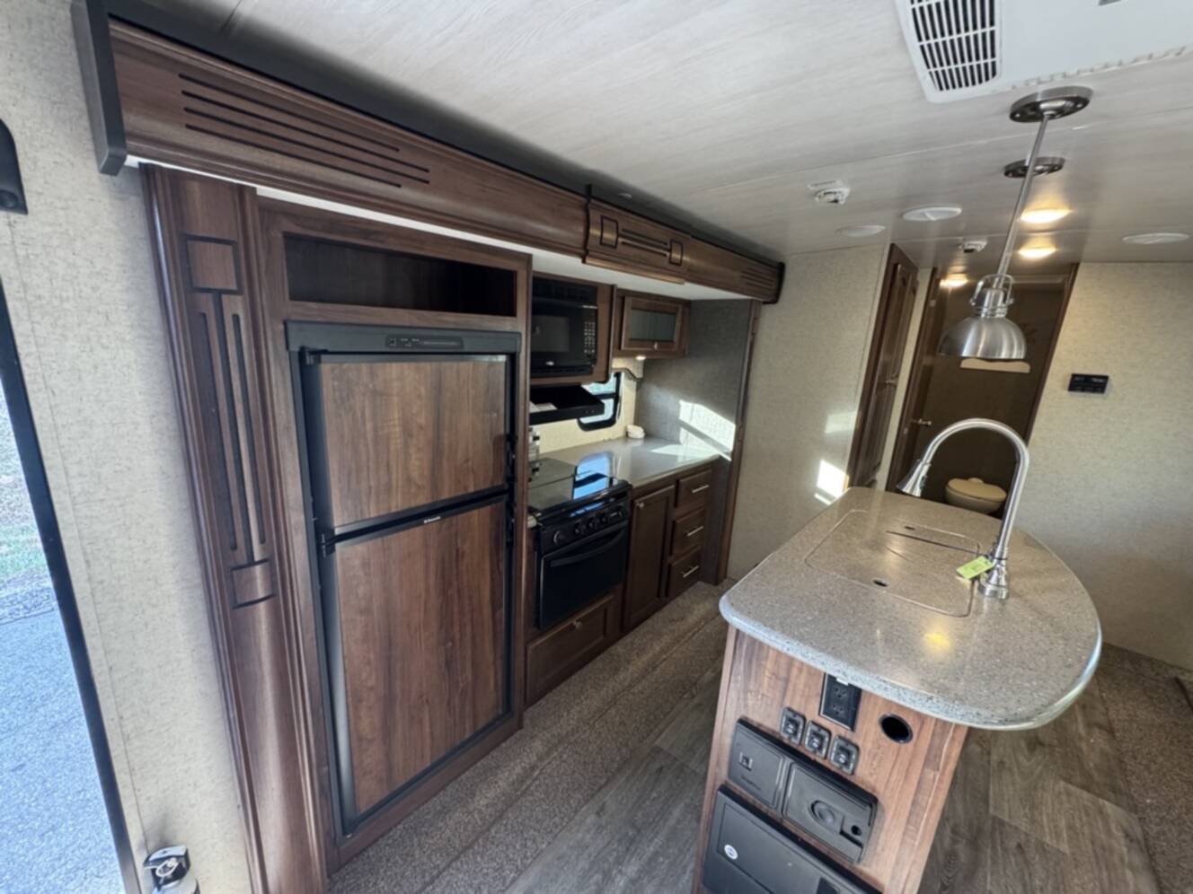 A photo of this 2017 Heartland NORTH TRAIL CALIBER 27RBDS