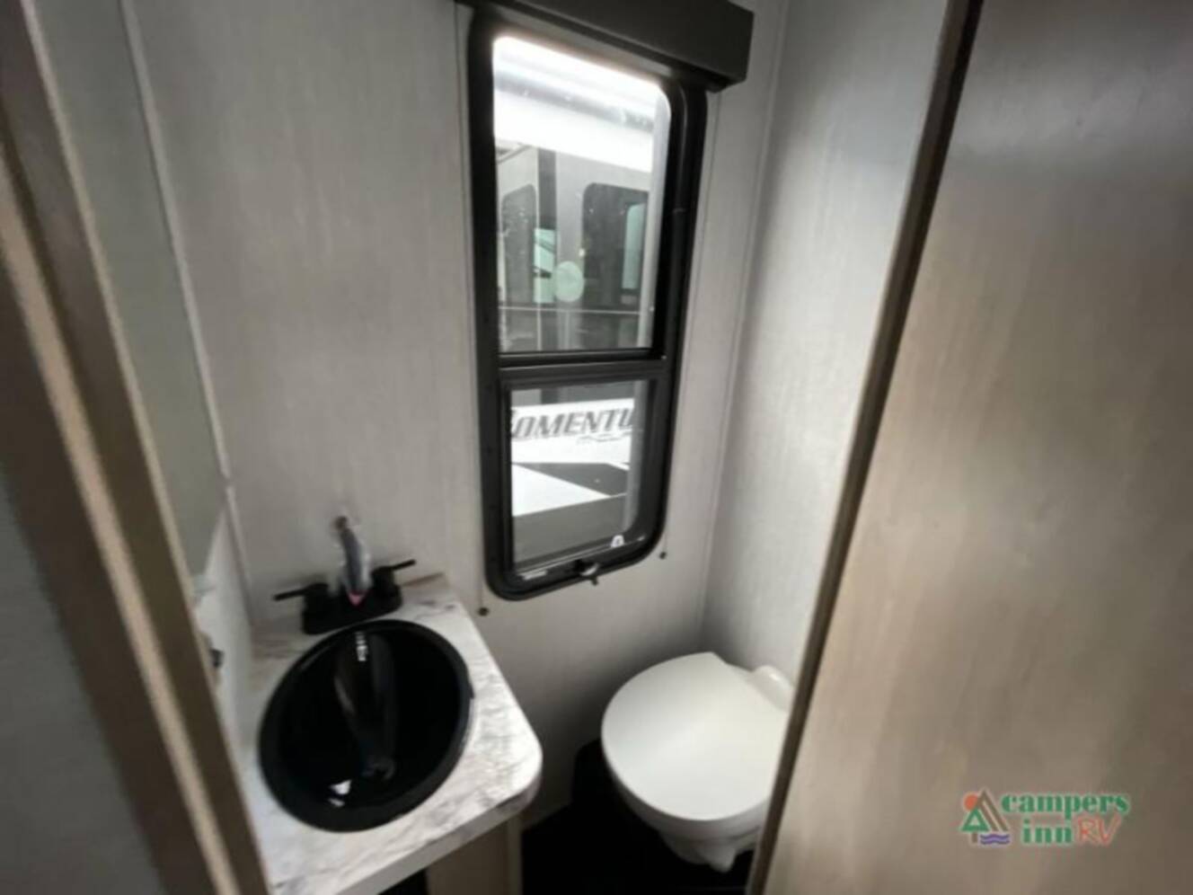 A photo of this 2024 Grand Design Momentum M-Class 414M
