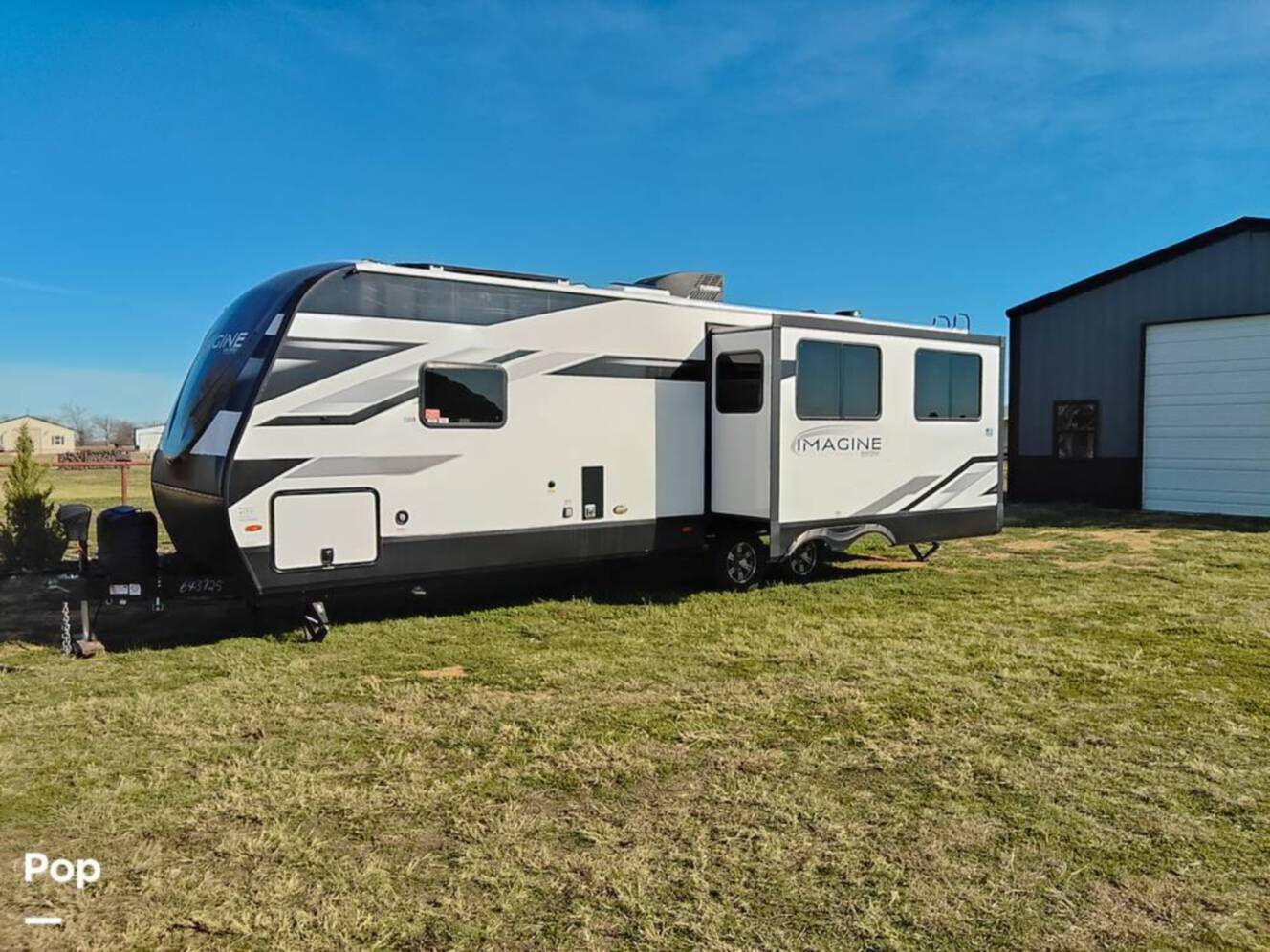 A photo of this 2023 Grand Design Imagine 2670MK