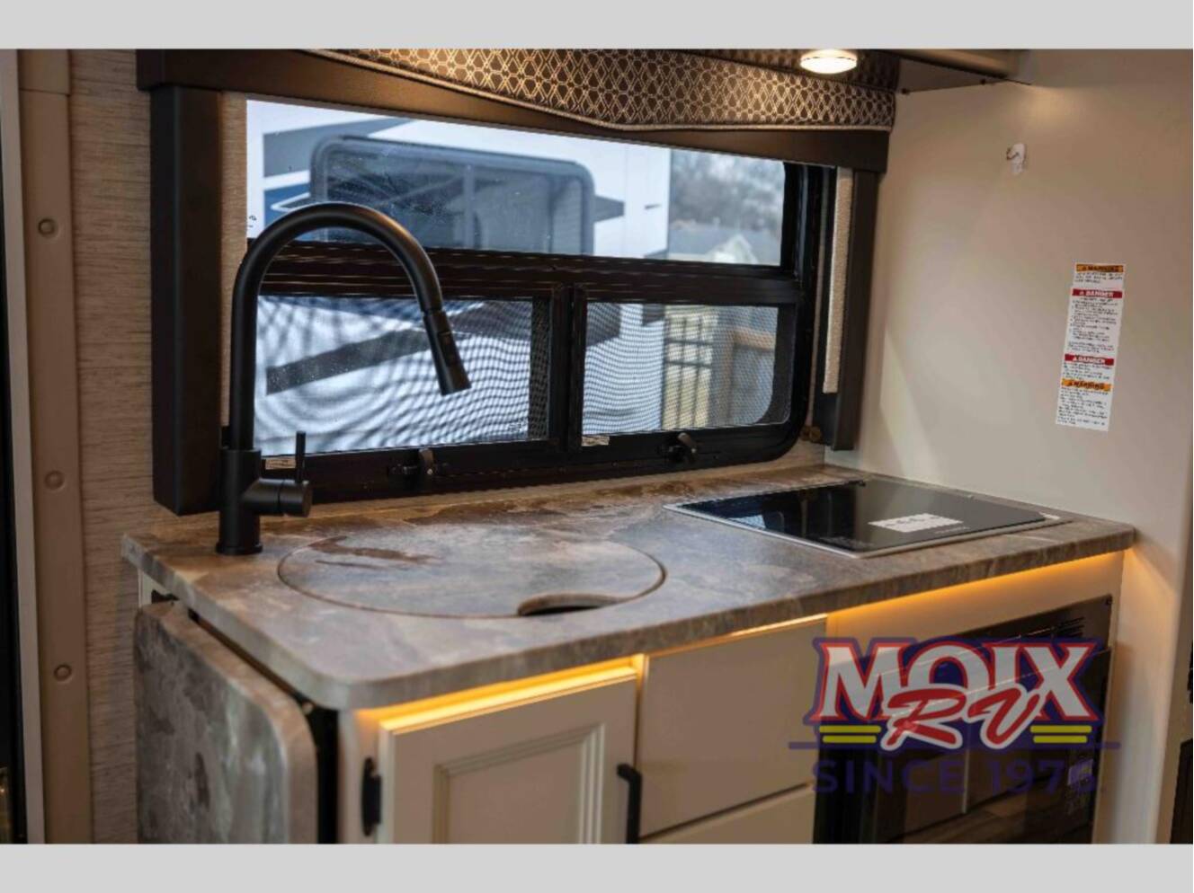 A photo of this 2023 Thor Motor Coach Axis 24.1