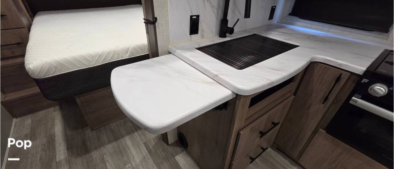 A photo of this 2023 Grand Design Imagine 2400BH