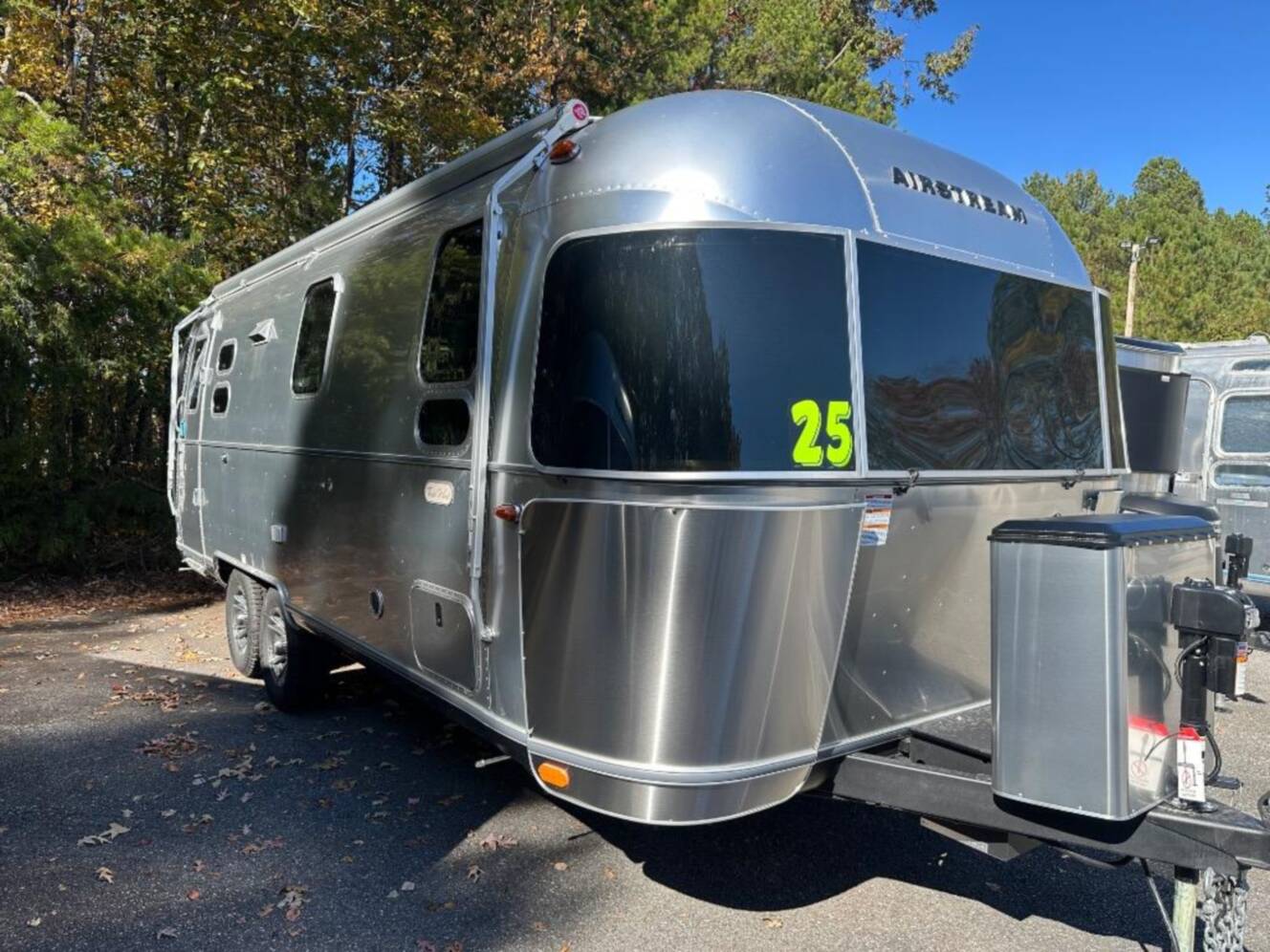 A photo of this 2026 Airstream Trade Wind 25FB Queen With Hatch