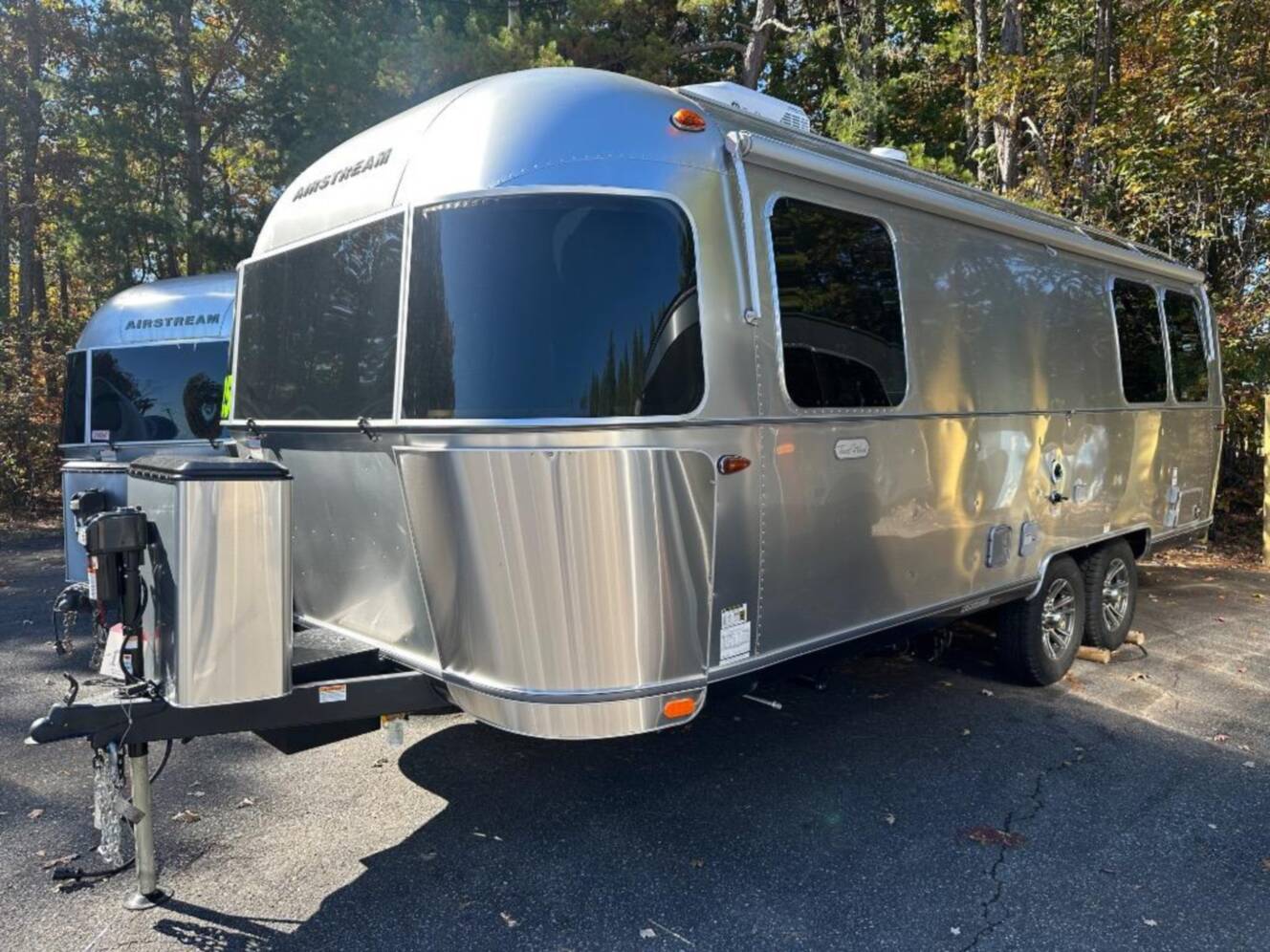 A photo of this 2026 Airstream Trade Wind 25FB Queen With Hatch