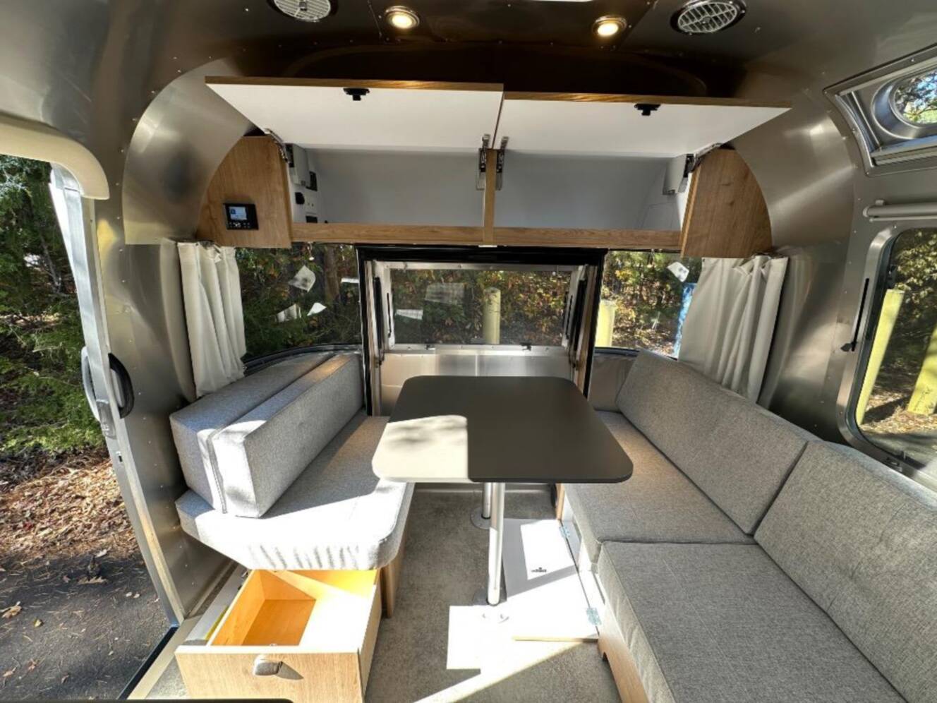 A photo of this 2026 Airstream Trade Wind 25FB Queen With Hatch