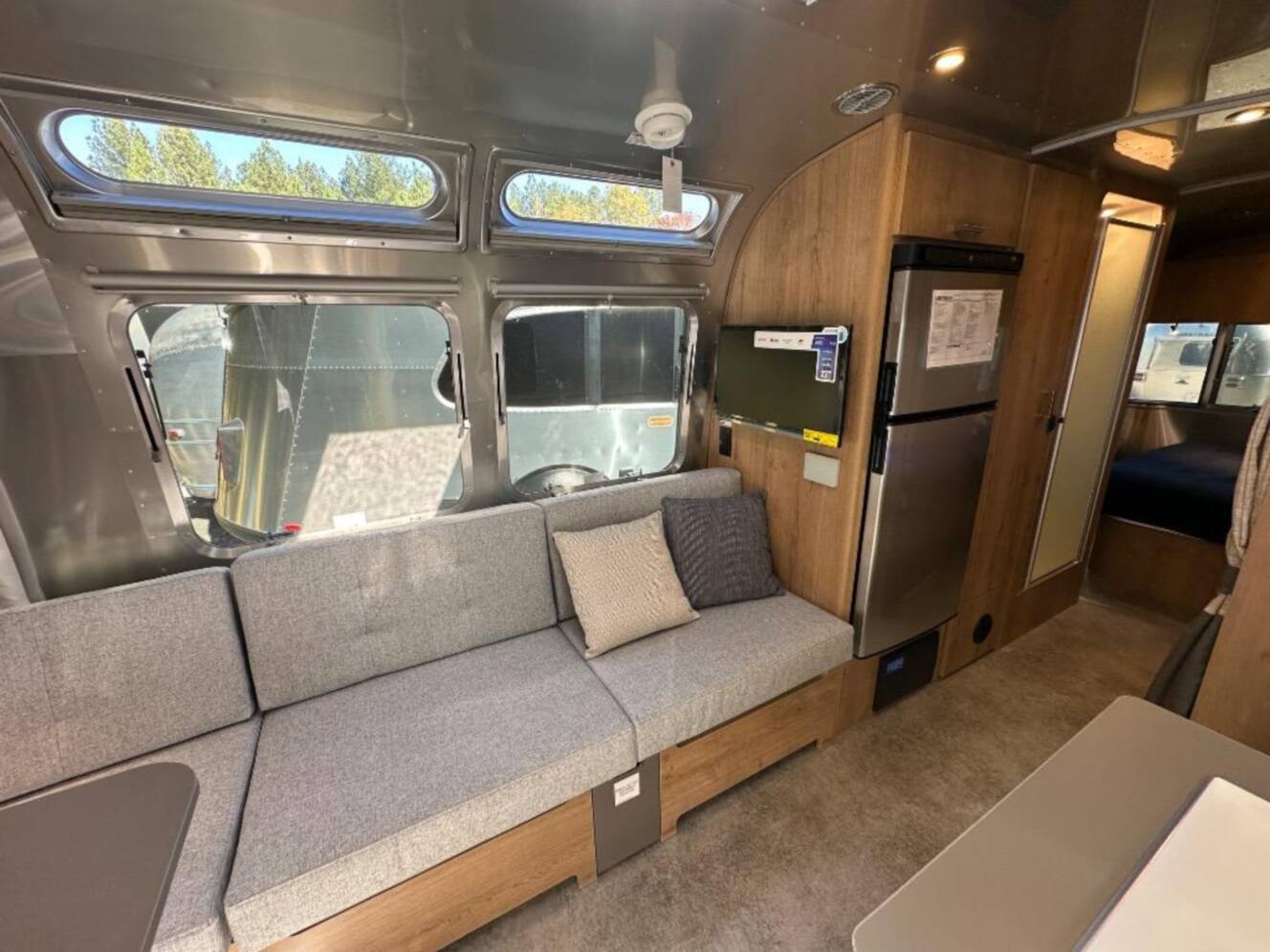 A photo of this 2026 Airstream Trade Wind 25FB Queen With Hatch