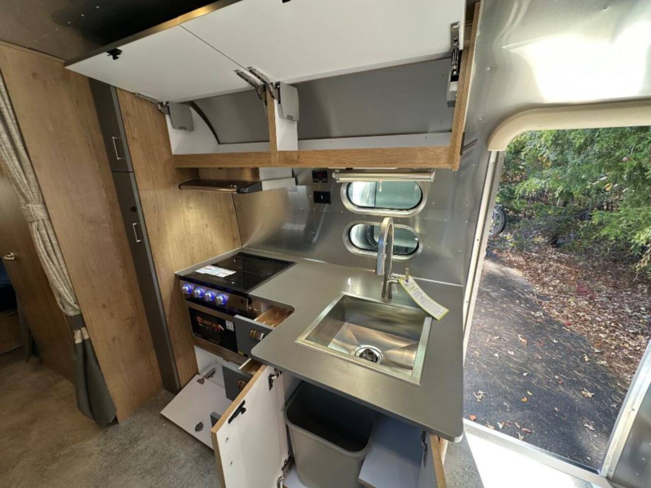 A photo of this 2026 Airstream Trade Wind 25FB Queen With Hatch