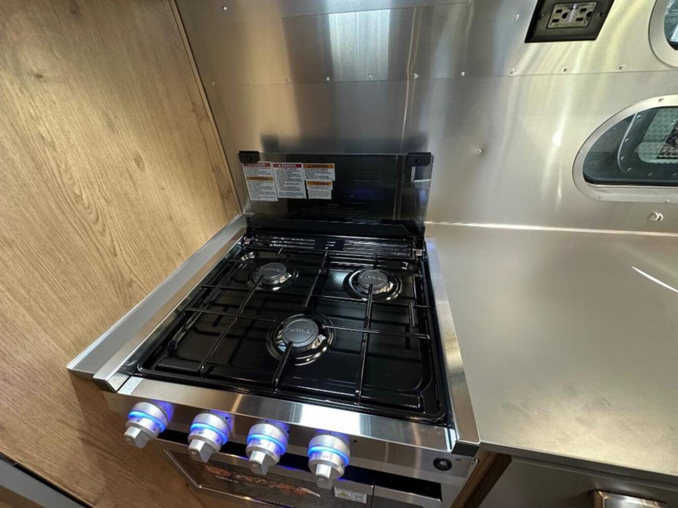 A photo of this 2026 Airstream Trade Wind 25FB Queen With Hatch