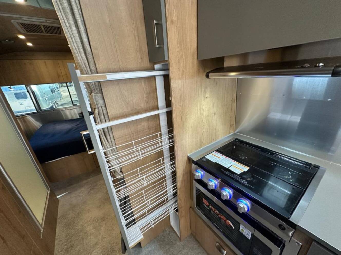 A photo of this 2026 Airstream Trade Wind 25FB Queen With Hatch
