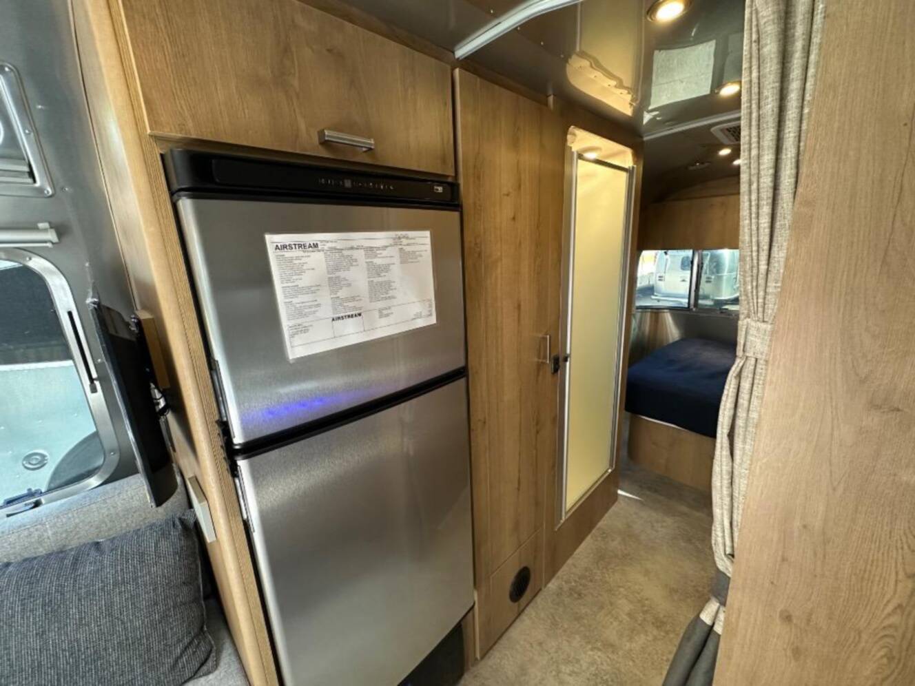 A photo of this 2026 Airstream Trade Wind 25FB Queen With Hatch