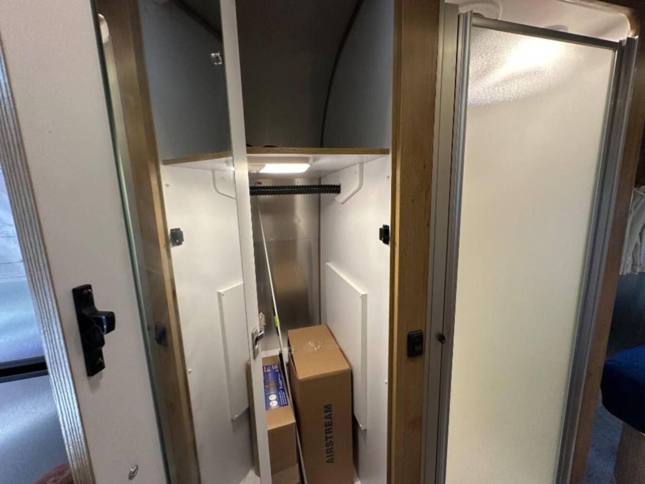 A photo of this 2026 Airstream Trade Wind 25FB Queen With Hatch