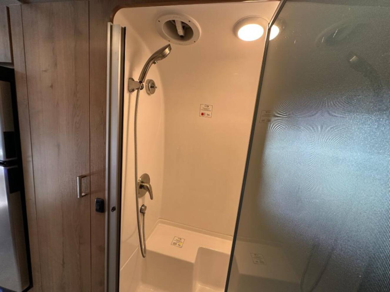 A photo of this 2026 Airstream Trade Wind 25FB Queen With Hatch