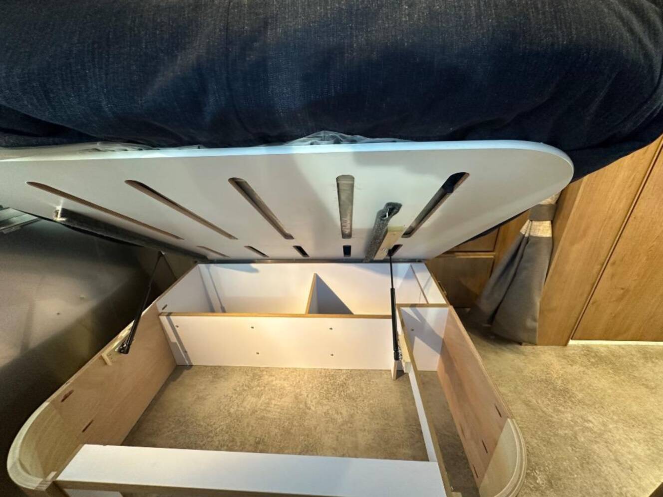 A photo of this 2026 Airstream Trade Wind 25FB Queen With Hatch