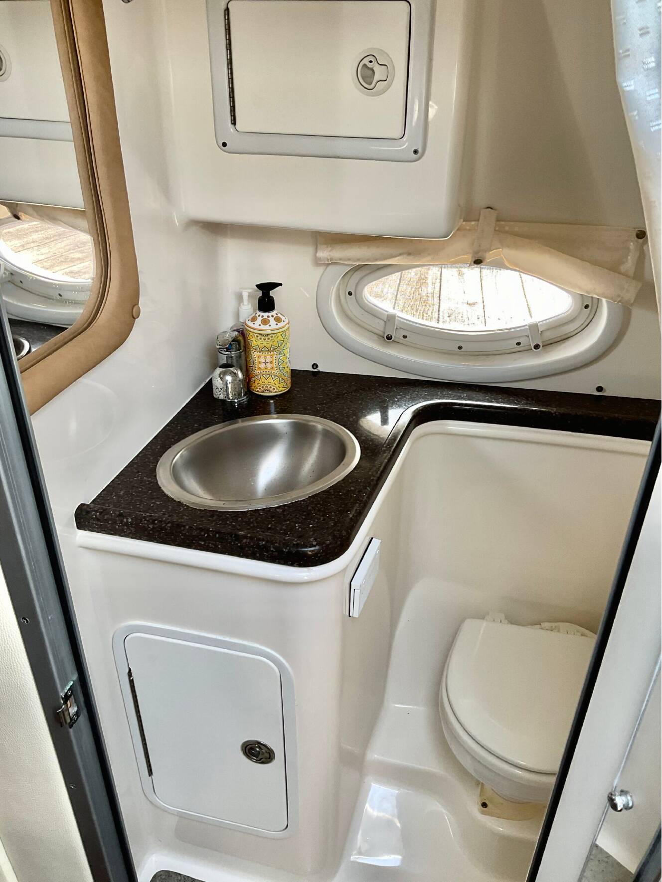 A photo of this 2013 Rinker 290 Express Cruiser