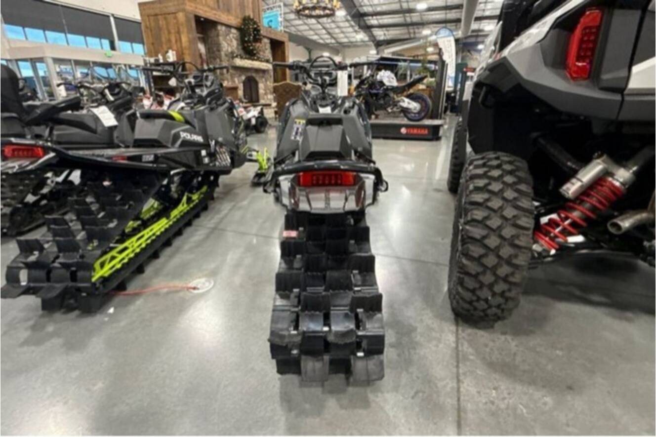 A photo of this 2026 Polaris® SNO-26 BOOST RMK KHAOS 155 Patriot Boost