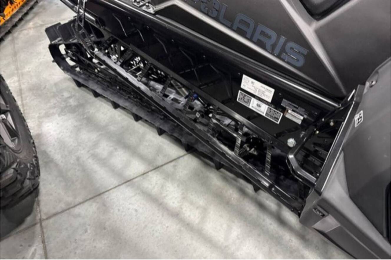 A photo of this 2026 Polaris® SNO-26 BOOST RMK KHAOS 155 Patriot Boost