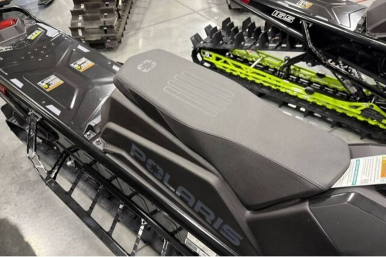 A photo of this 2026 Polaris® SNO-26 BOOST RMK KHAOS 155 Patriot Boost