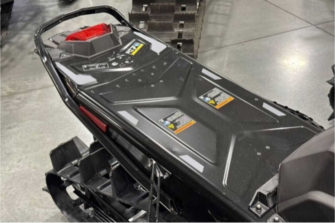 A photo of this 2026 Polaris® SNO-26 BOOST RMK KHAOS 155 Patriot Boost