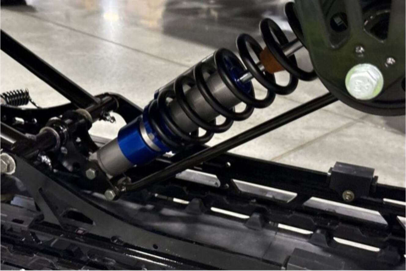 A photo of this 2026 Polaris® SNO-26 BOOST RMK KHAOS 155 Patriot Boost