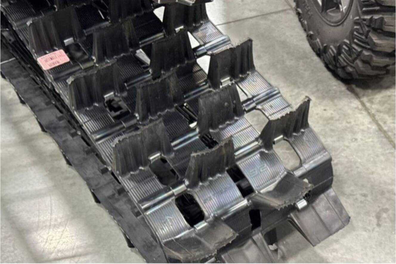A photo of this 2026 Polaris® SNO-26 BOOST RMK KHAOS 155 Patriot Boost