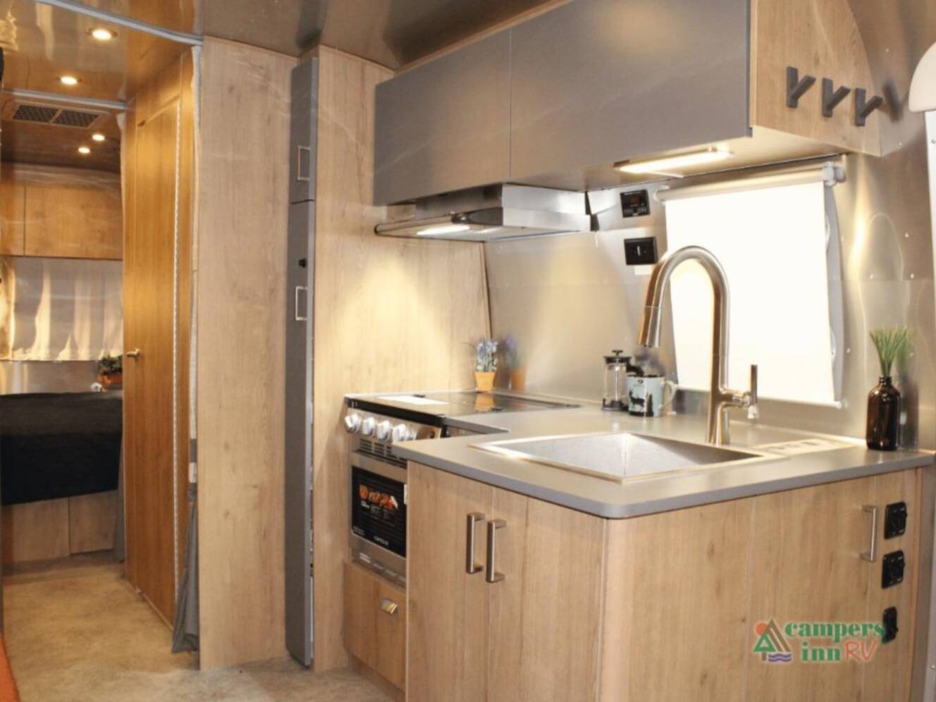 A photo of this 2026 Airstream Trade Wind 25FBQ