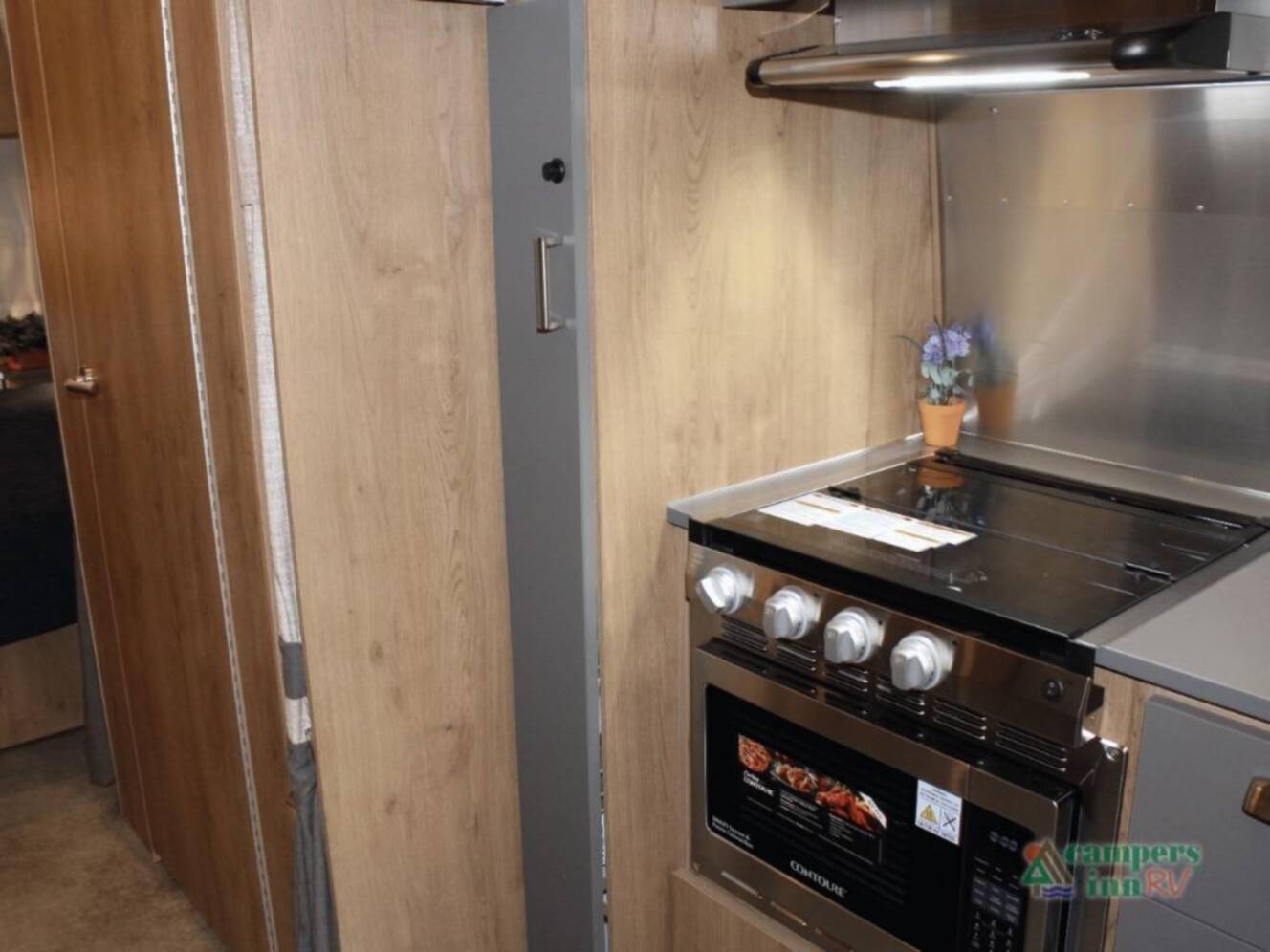 A photo of this 2026 Airstream Trade Wind 25FBQ