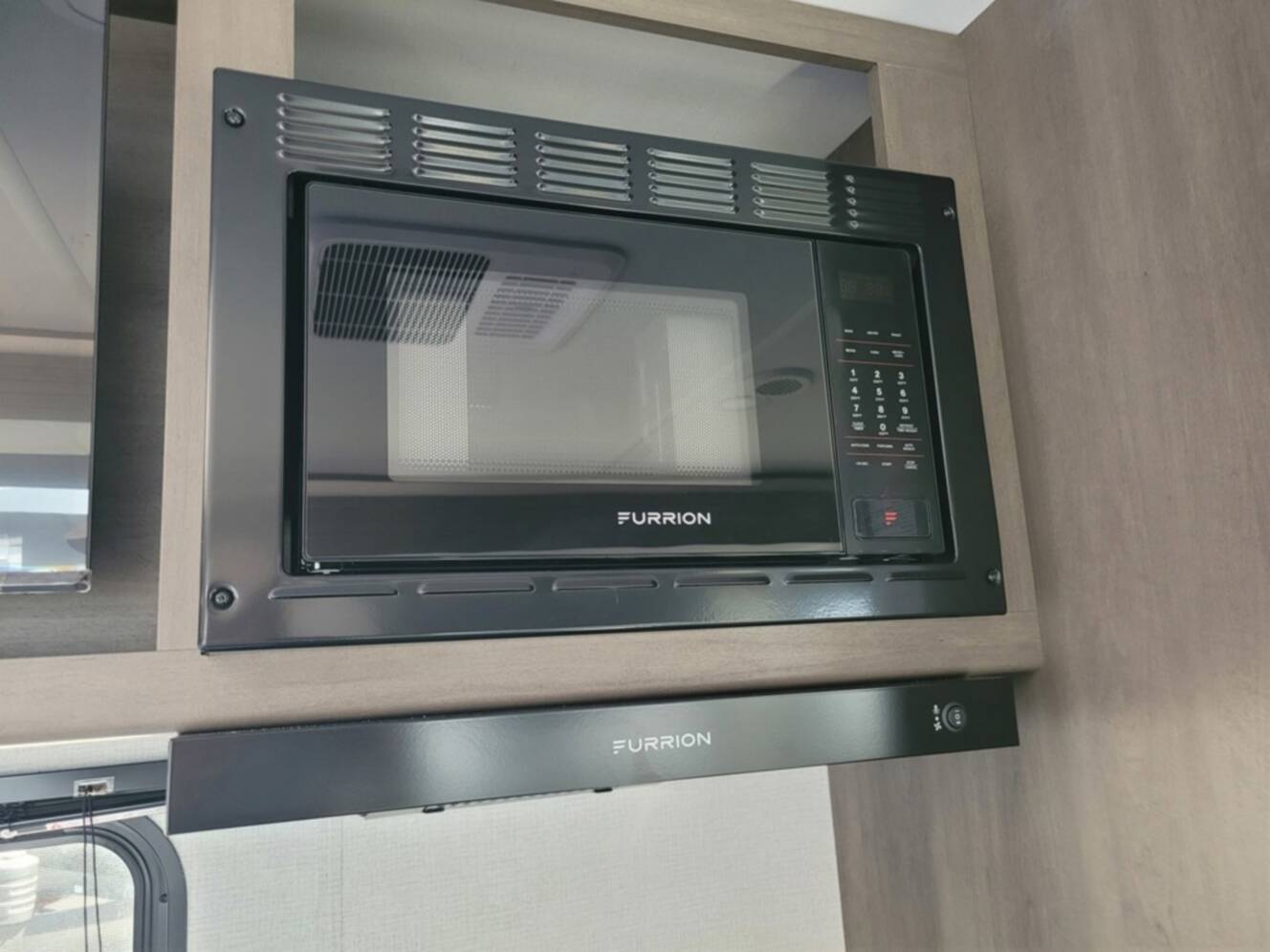 A photo of this 2026 Grand Design Transcend 325BHT
