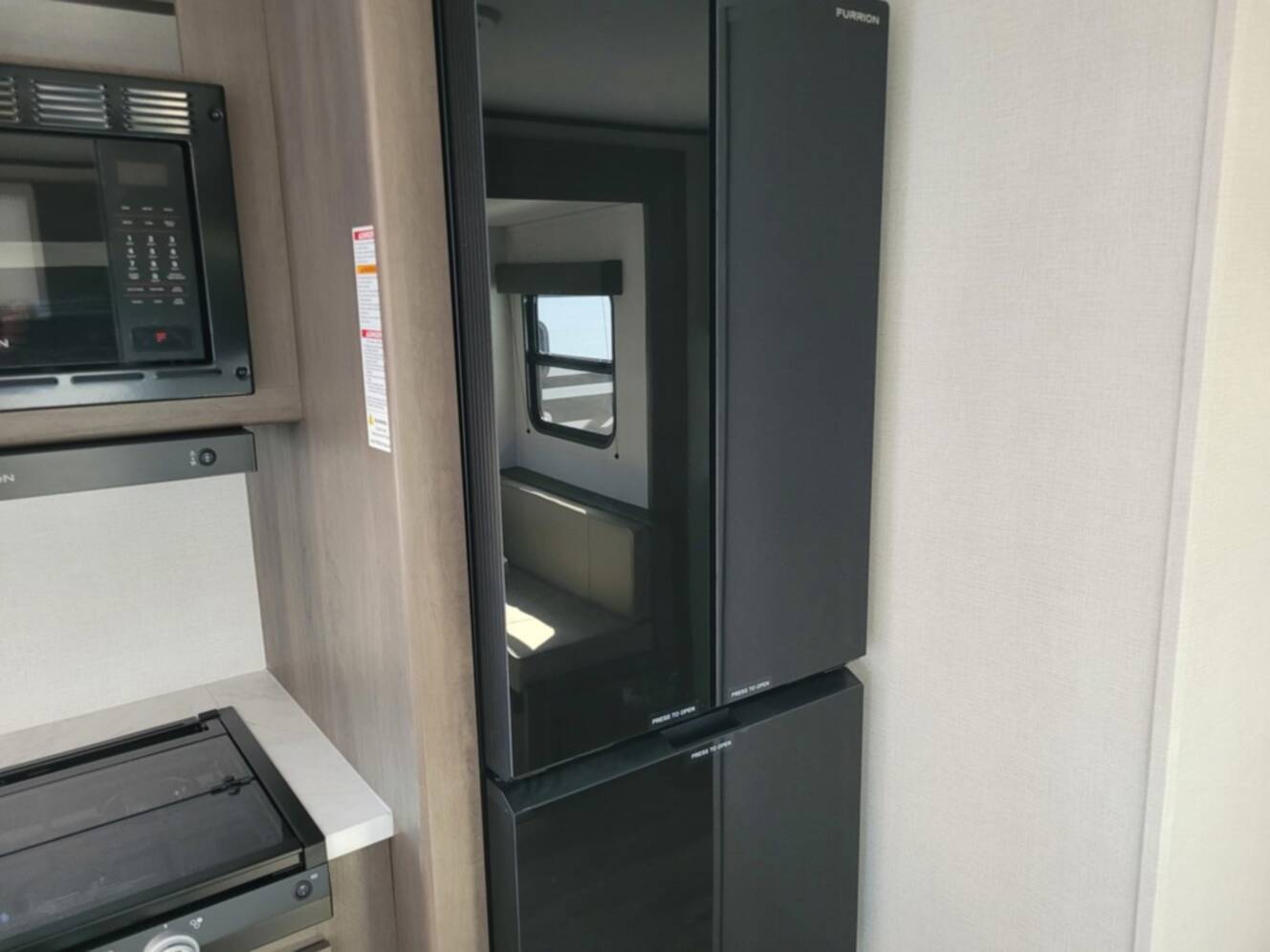 A photo of this 2026 Grand Design Transcend 325BHT