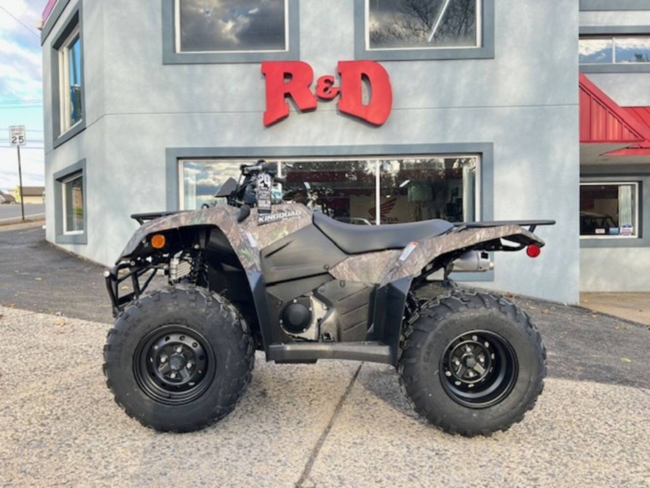 A photo of this 2025 Suzuki KingQuad 400ASi Camo