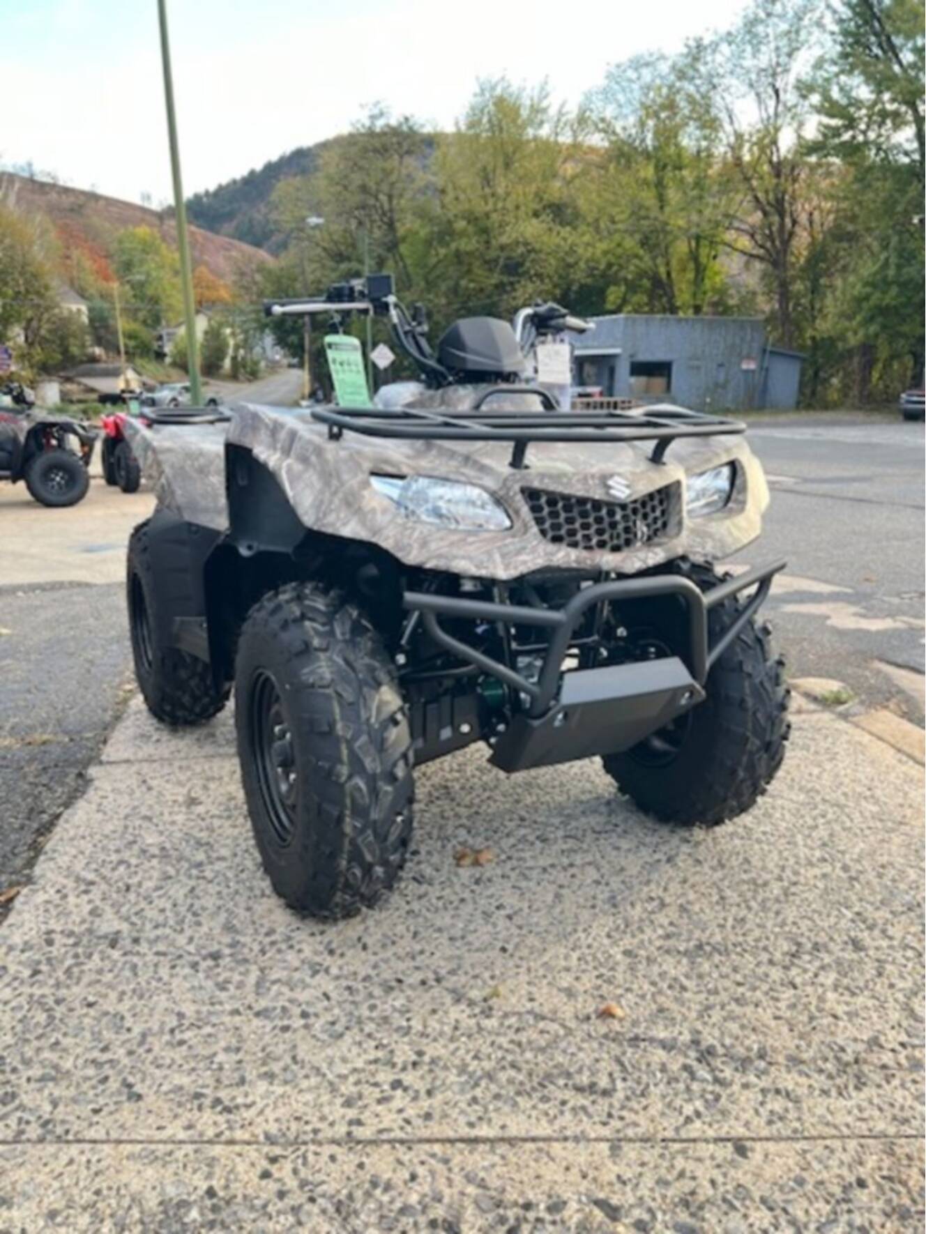 A photo of this 2025 Suzuki KingQuad 400ASi Camo