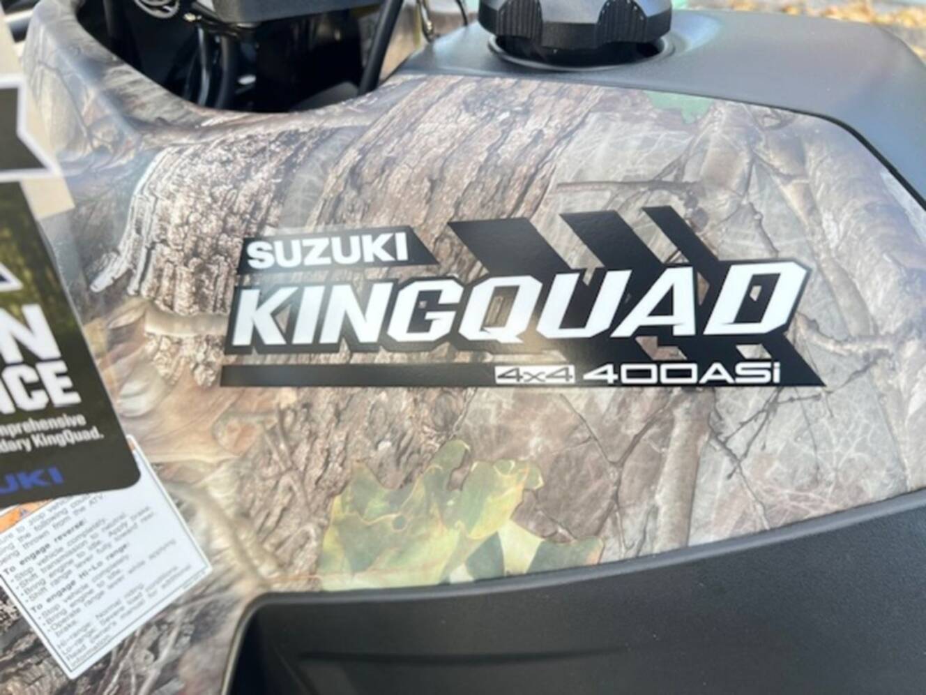 A photo of this 2025 Suzuki KingQuad 400ASi Camo