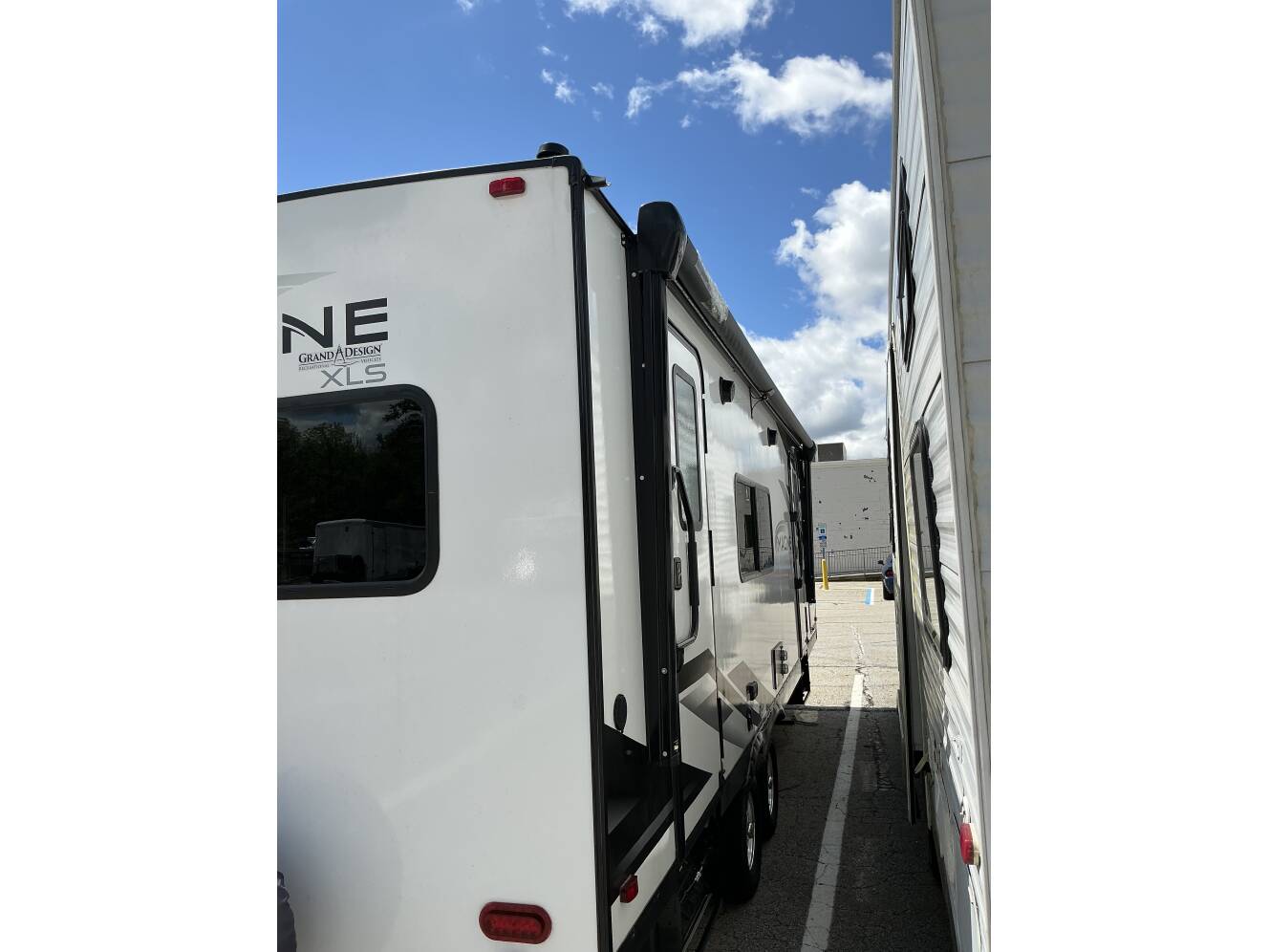 A photo of this 2022 Grand Design IMAGINE XLS 24LDE