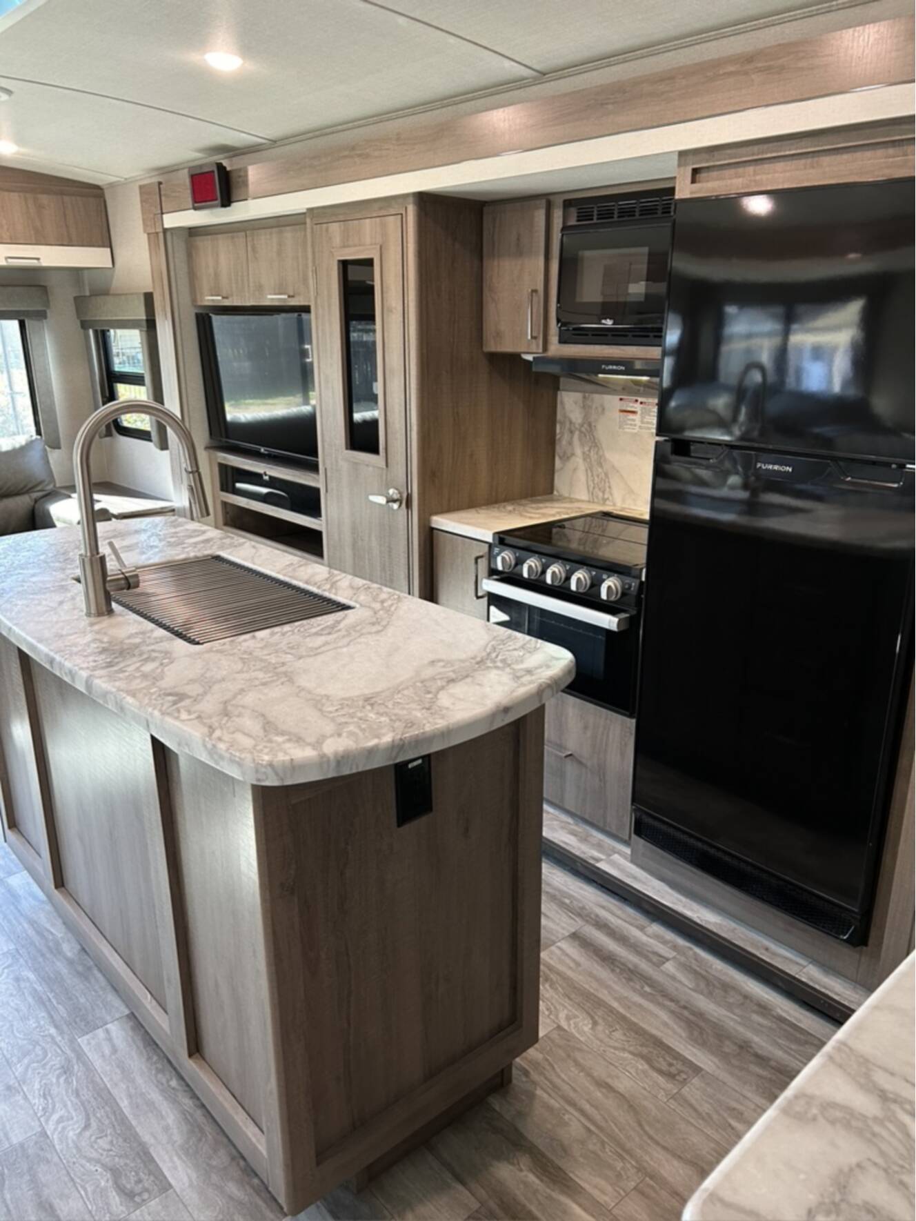 A photo of this 2022 Grand Design IMAGINE 2970RL