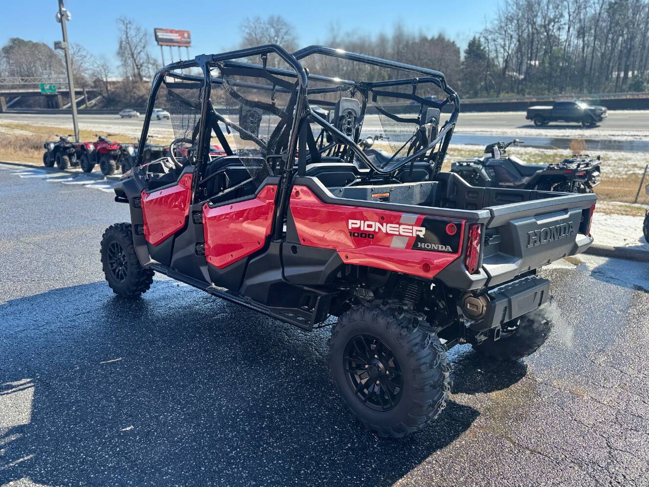 A photo of this 2025 Honda Pioneer 1000-6 Deluxe Crew