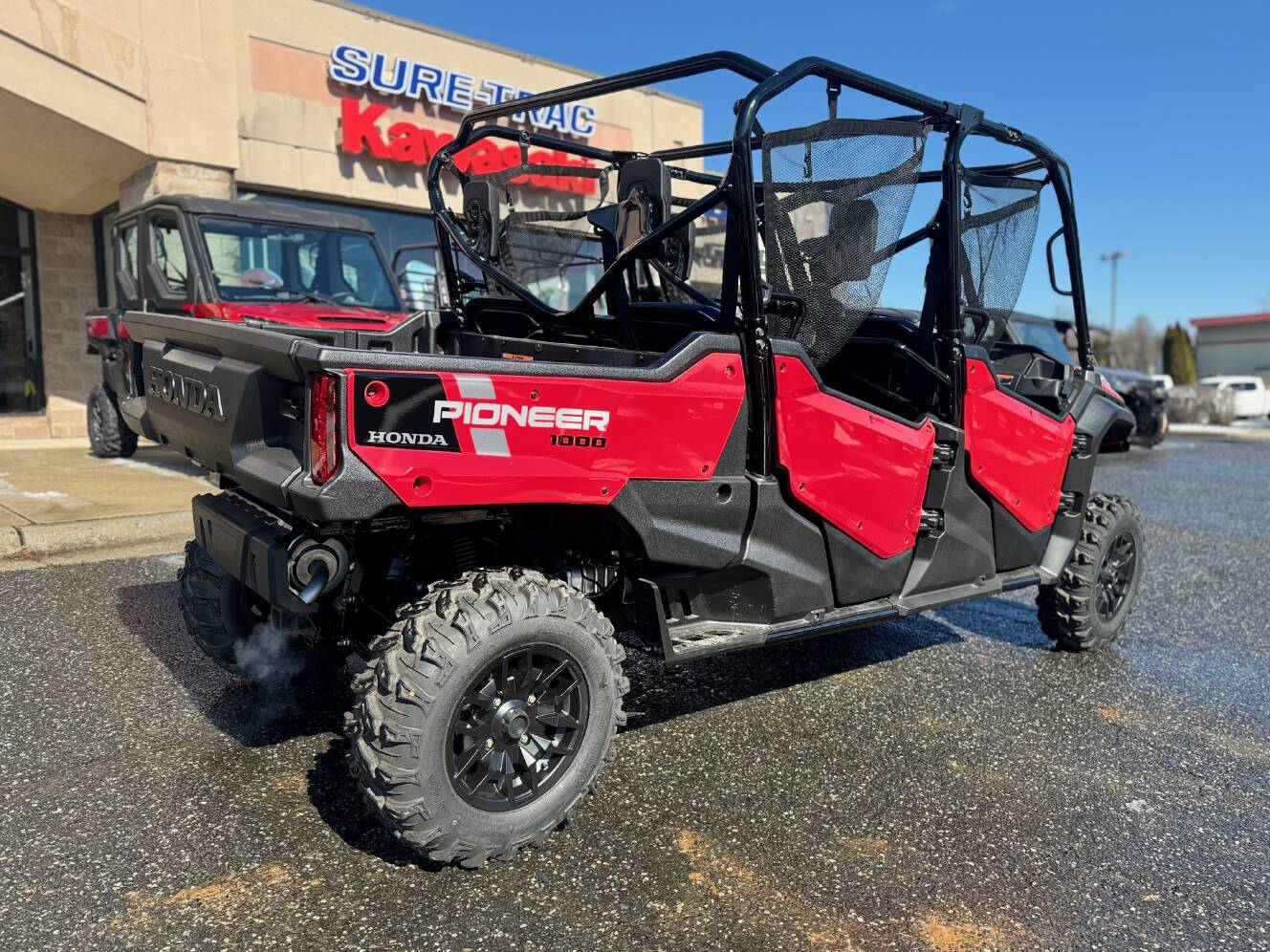 A photo of this 2025 Honda Pioneer 1000-6 Deluxe Crew