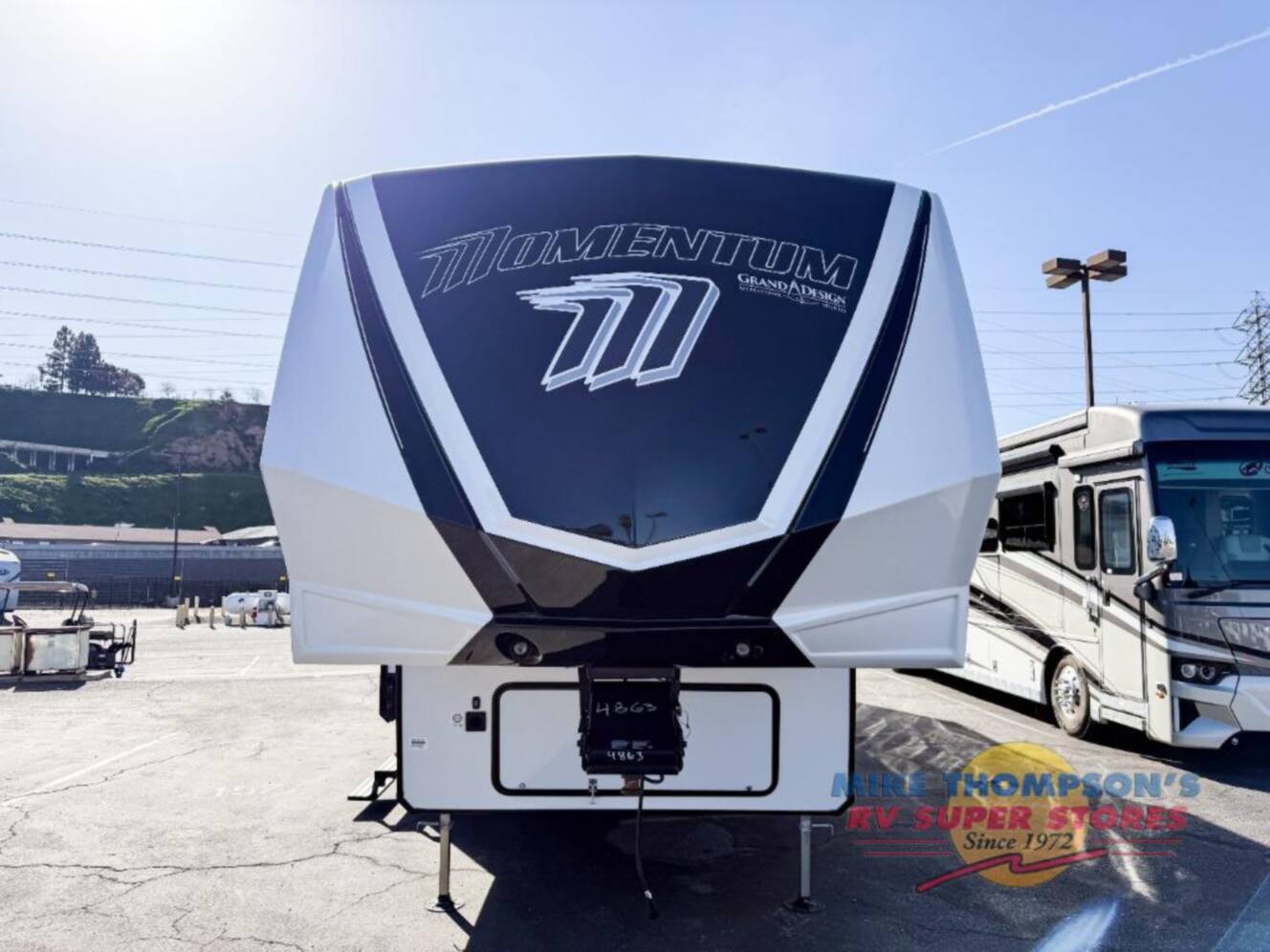 A photo of this 2026 Grand Design Momentum G-Class 394G
