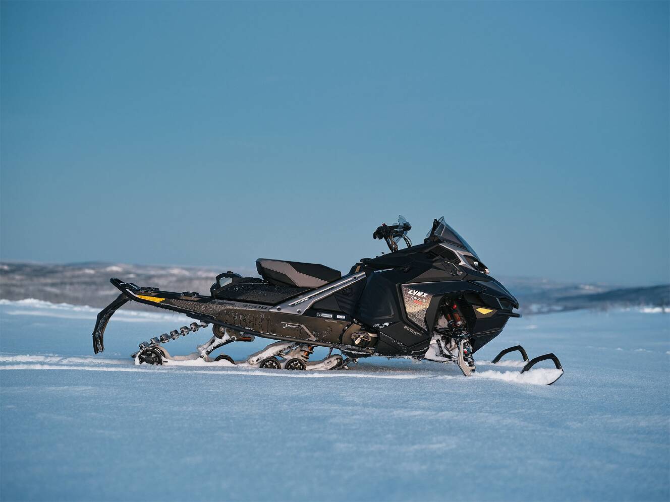 A photo of this 2026 Lynx Rave RE 850 E-TEC Turbo R w/ WIS Ice Ripper XT 1.5 SHO