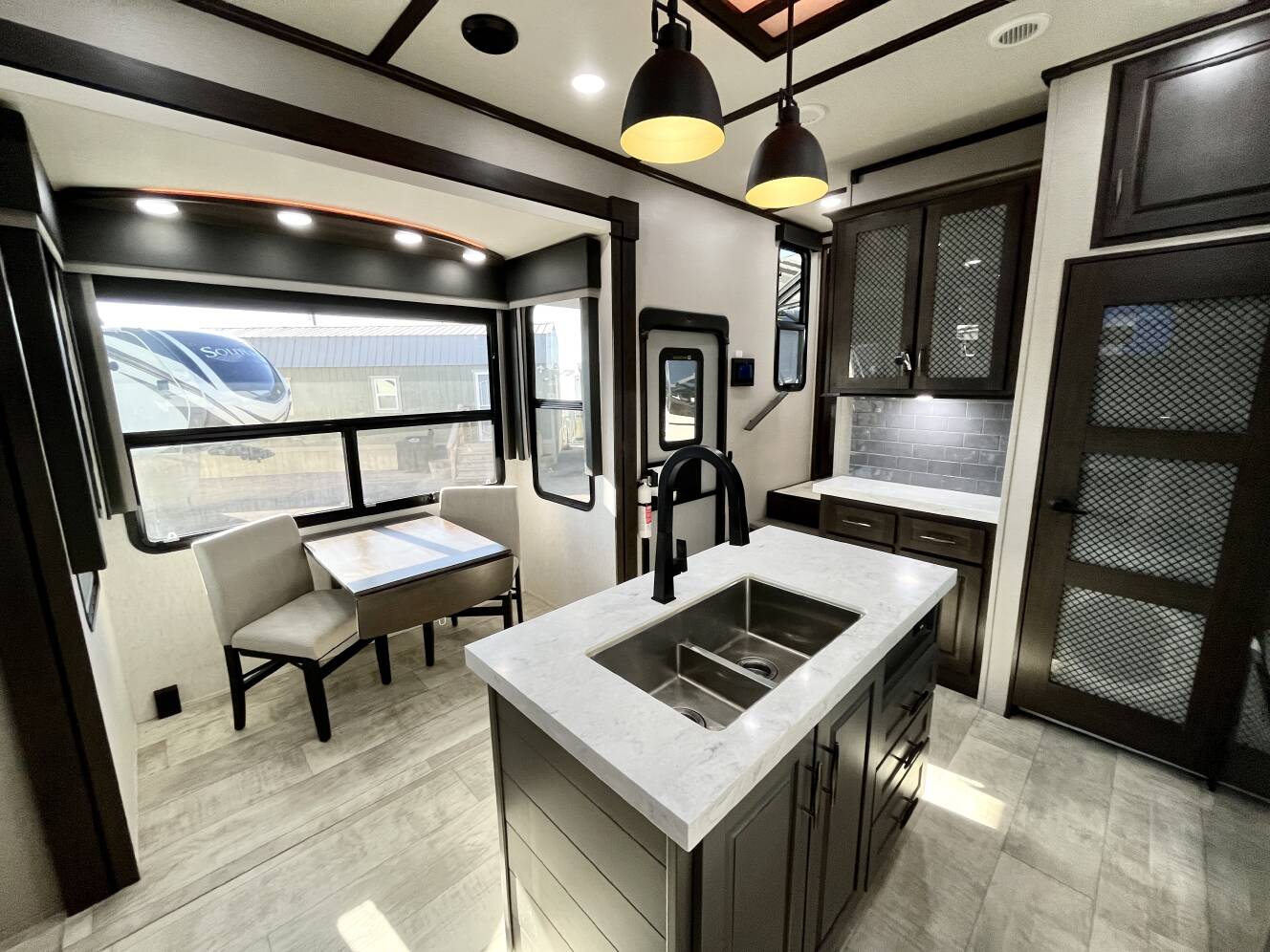 A photo of this 2022 Grand Design MOMENTUM 376THS