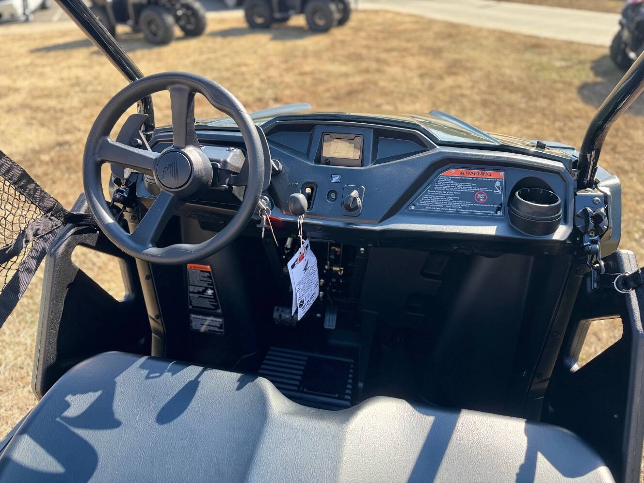 A photo of this 2026 Honda® Pioneer 520