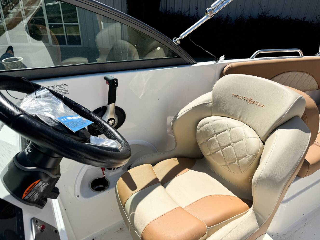 A photo of this 2024 Nautic Star DC DECK BOAT