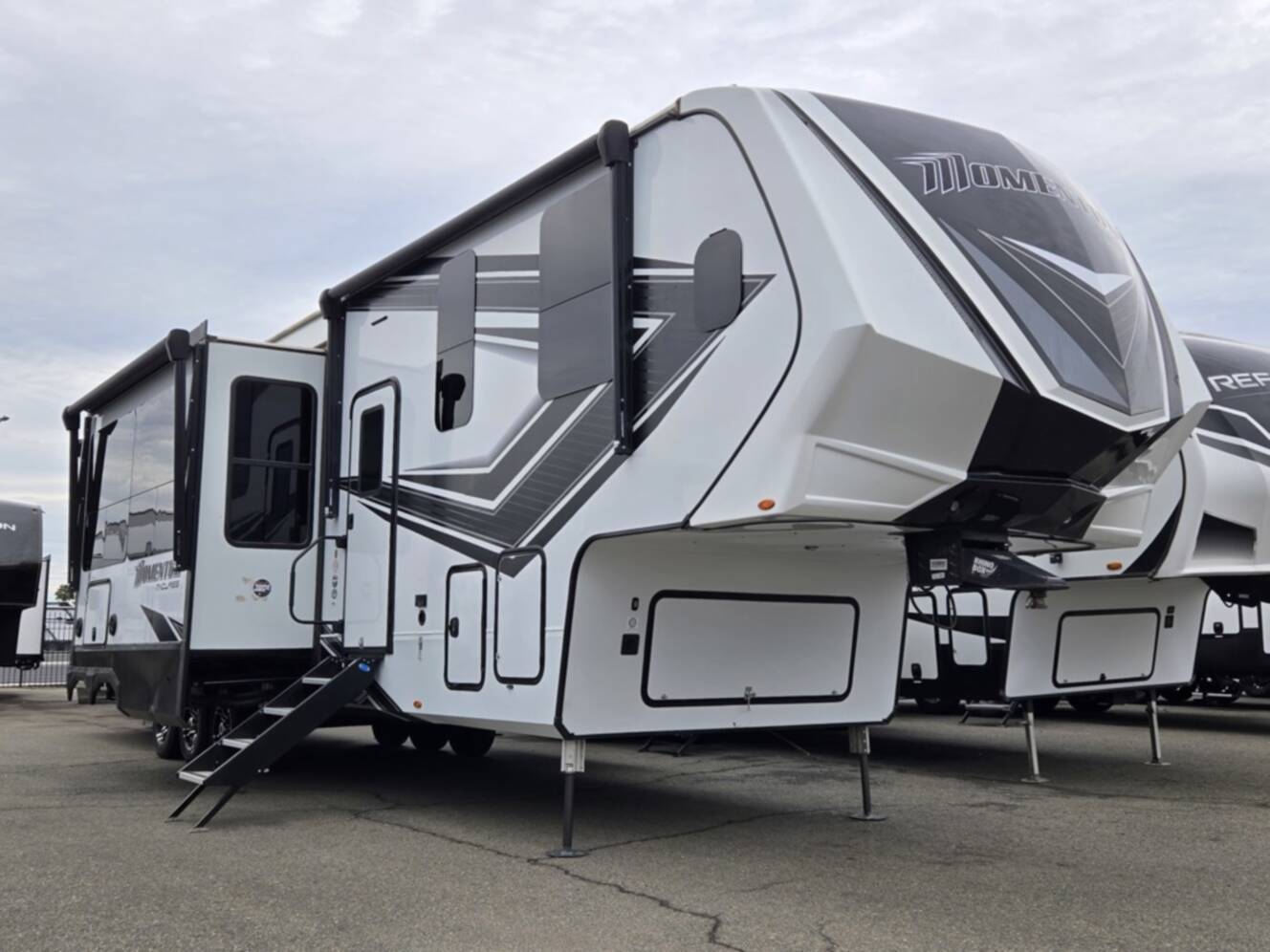 A photo of this 2023 Grand Design Momentum 395MS