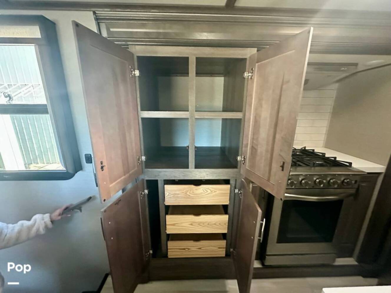 A photo of this 2023 Grand Design Solitude 390RK