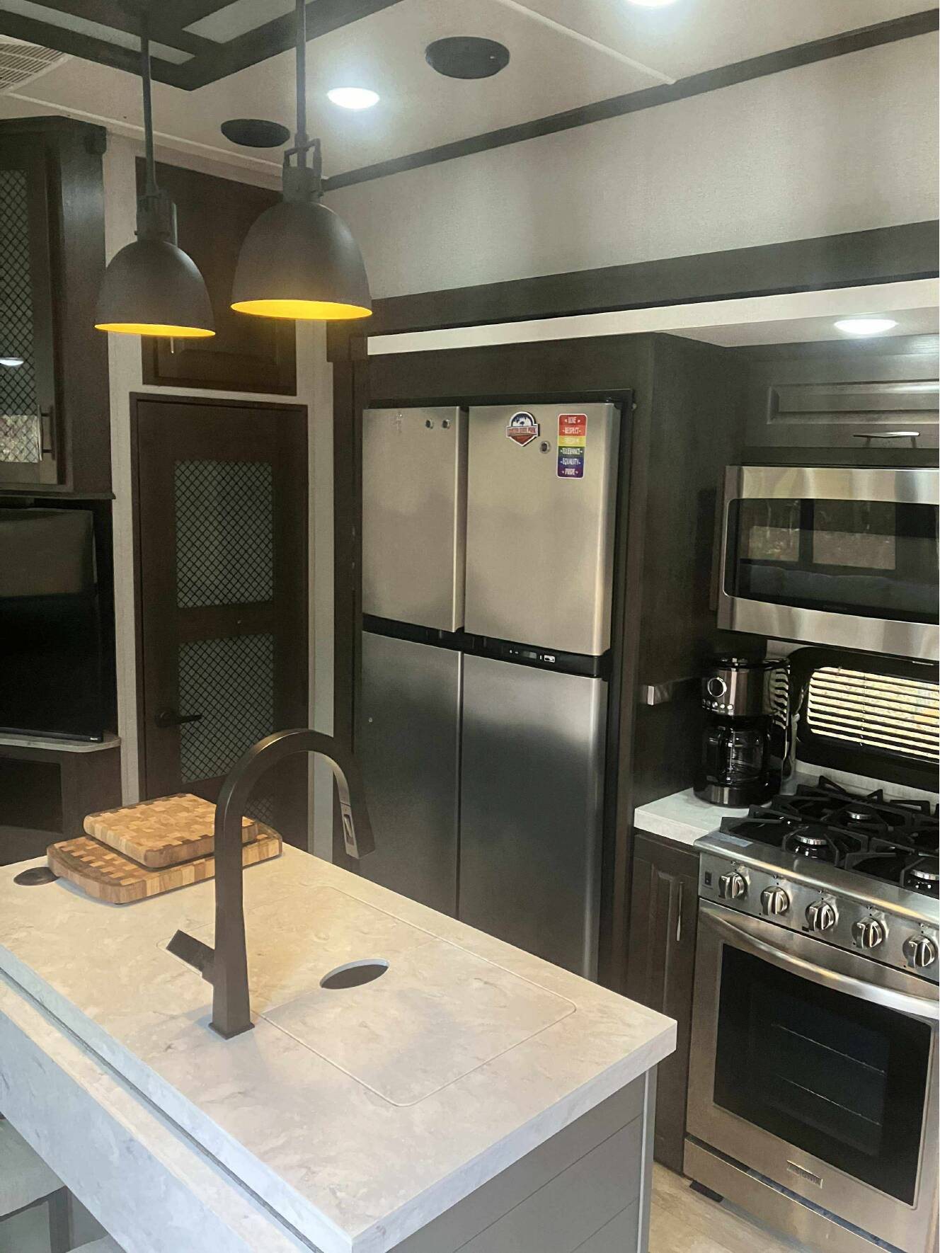A photo of this 2022 Grand Design MOMENTUM M-CLASS 351M