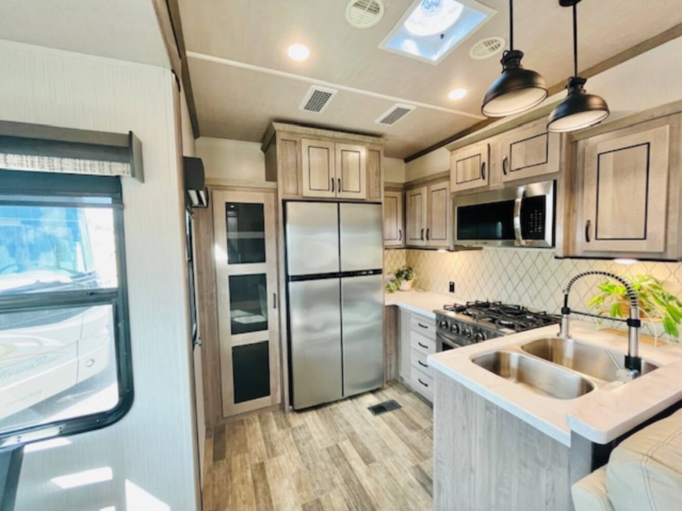 A photo of this 2021 Forest River CEDAR CREEK 388RK