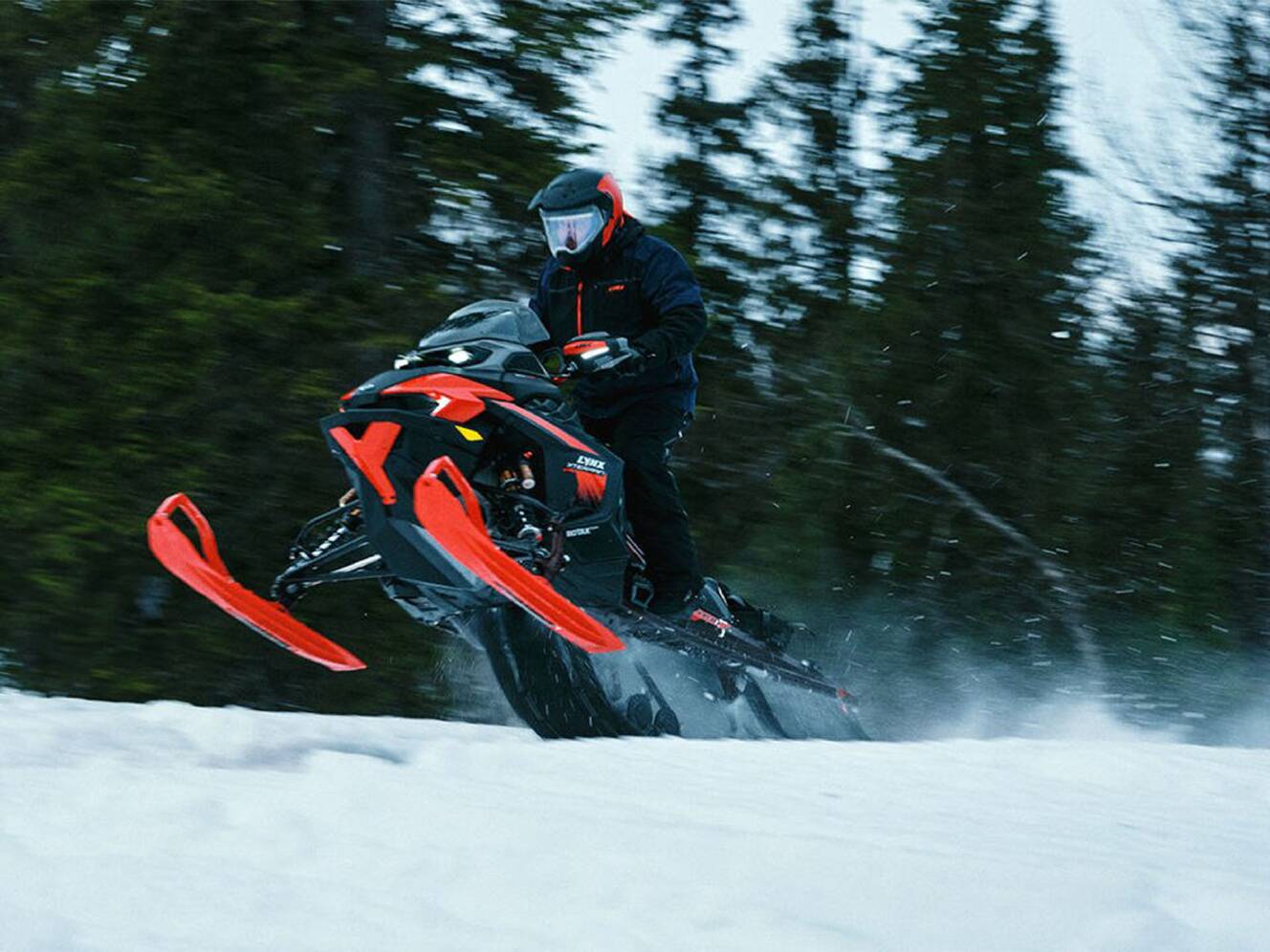 A photo of this 2026 Lynx Xterrain RE 850 E-TEC PowderMax 2.0 M.S. / E.S. w/ 10.
