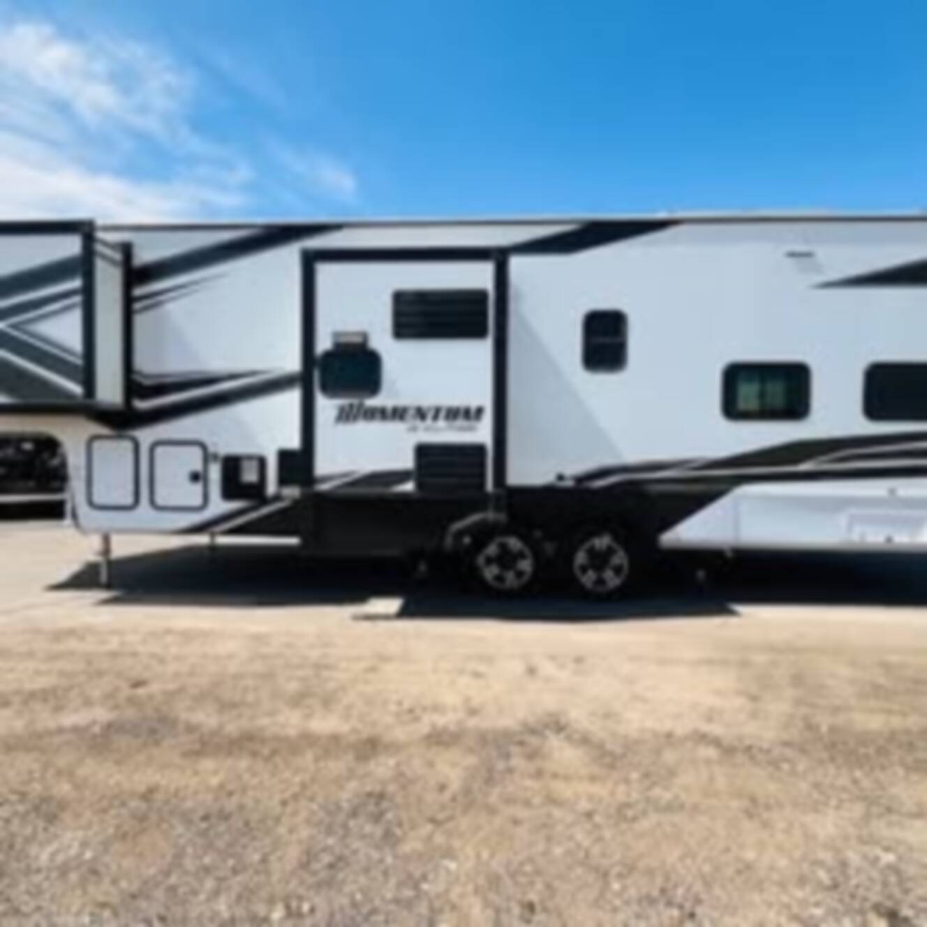 A photo of this 2023 Grand Design MOMENTUM 320G